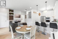 Dining Area Looking Out To Patio - 