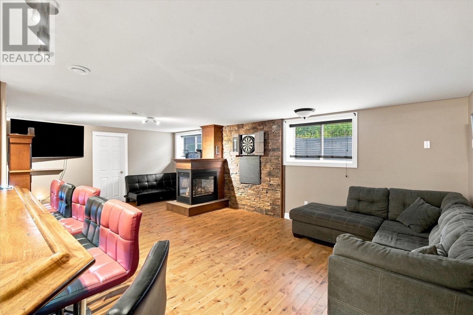 6 Oceanview Drive, Witless Bay, NL - Indoor Photo Showing Living Room With Fireplace