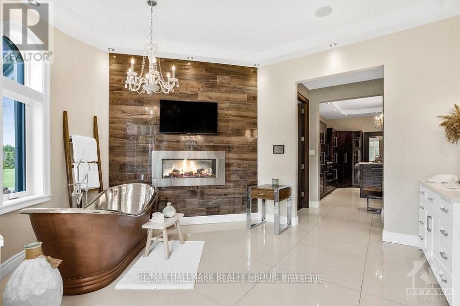 1409 Aberdeen Road, Champlain, ON - Indoor Photo Showing Living Room With Fireplace