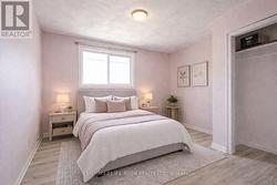 Virtually Staged to show potential. Bedroom 2 - 