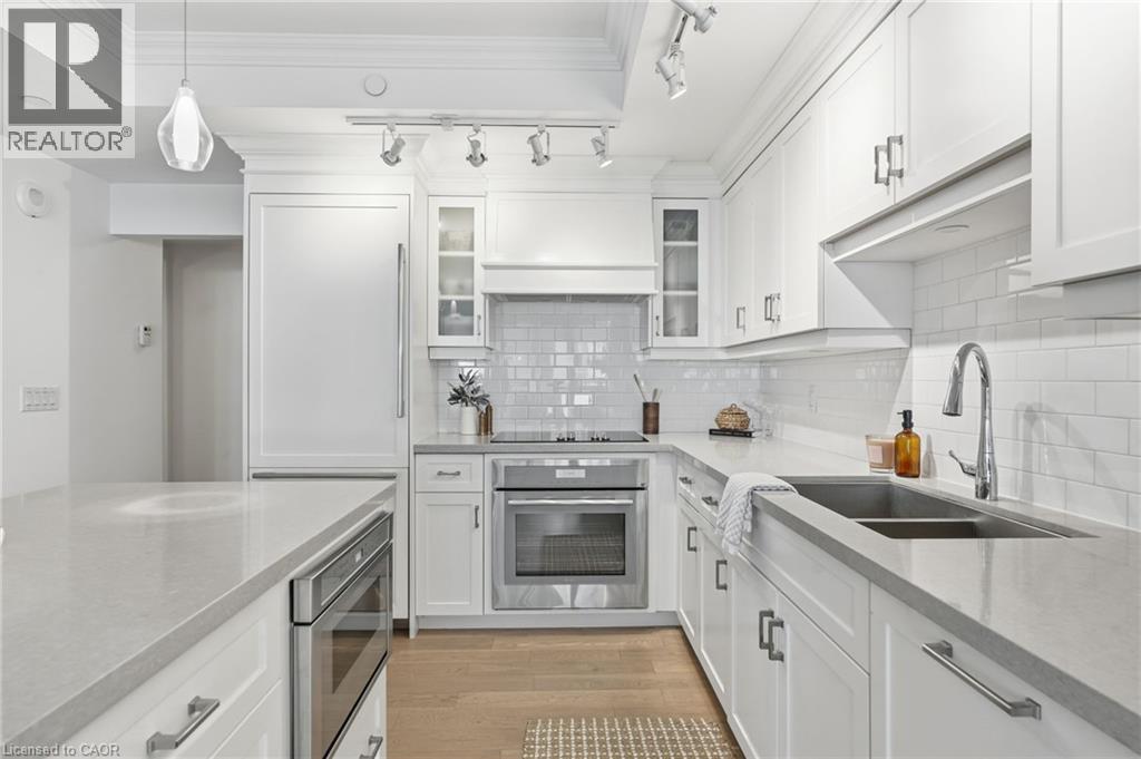 2060 Lakeshore Road Unit# 310, Burlington, ON - Indoor Photo Showing Kitchen With Double Sink With Upgraded Kitchen
