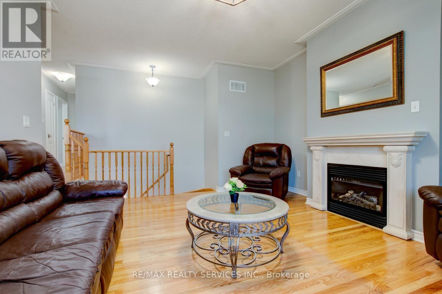 35 Hardgate Crescent, Brampton, ON - Indoor Photo Showing Living Room With Fireplace