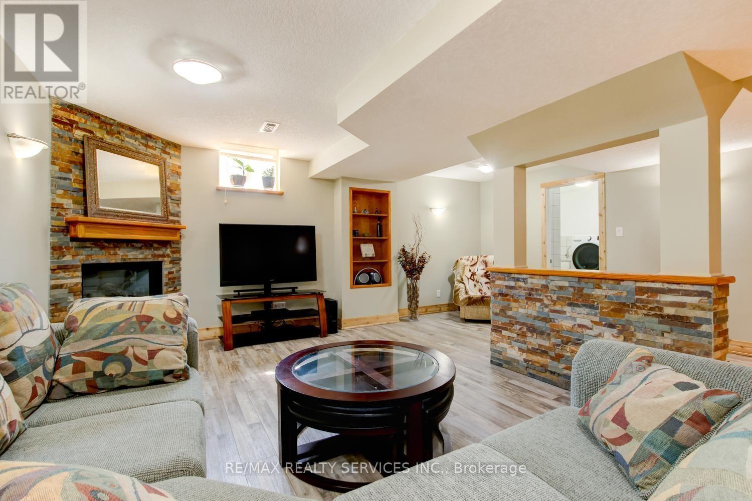 35 Hardgate Crescent, Brampton, ON - Indoor Photo Showing Living Room With Fireplace
