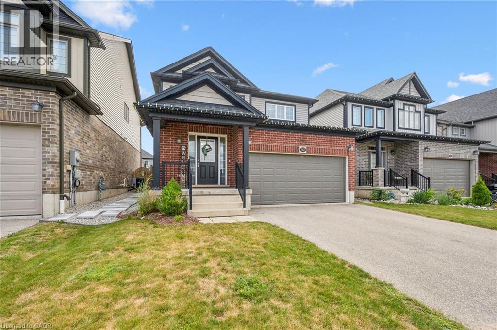 Brick and siding exterior with a covered porch - 360 Freure Drive, Cambridge, ON - Outdoor With Facade