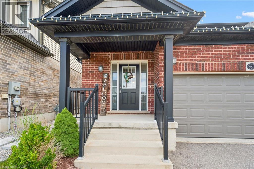 Brick exterior with a covered porch entry - 360 Freure Drive, Cambridge, ON - Outdoor
