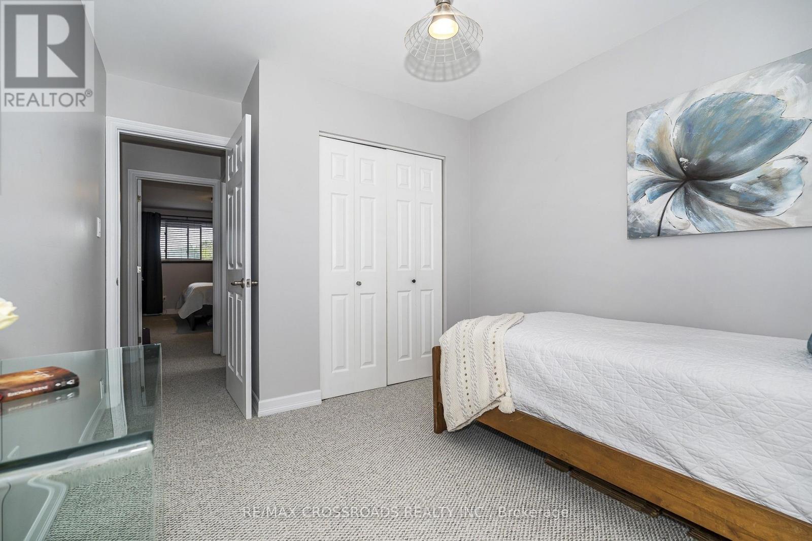 Overlooks Back Garden and Has a Double Closet - 655 Dodsworth Crescent, Mississauga, ON - Indoor Photo Showing Bedroom