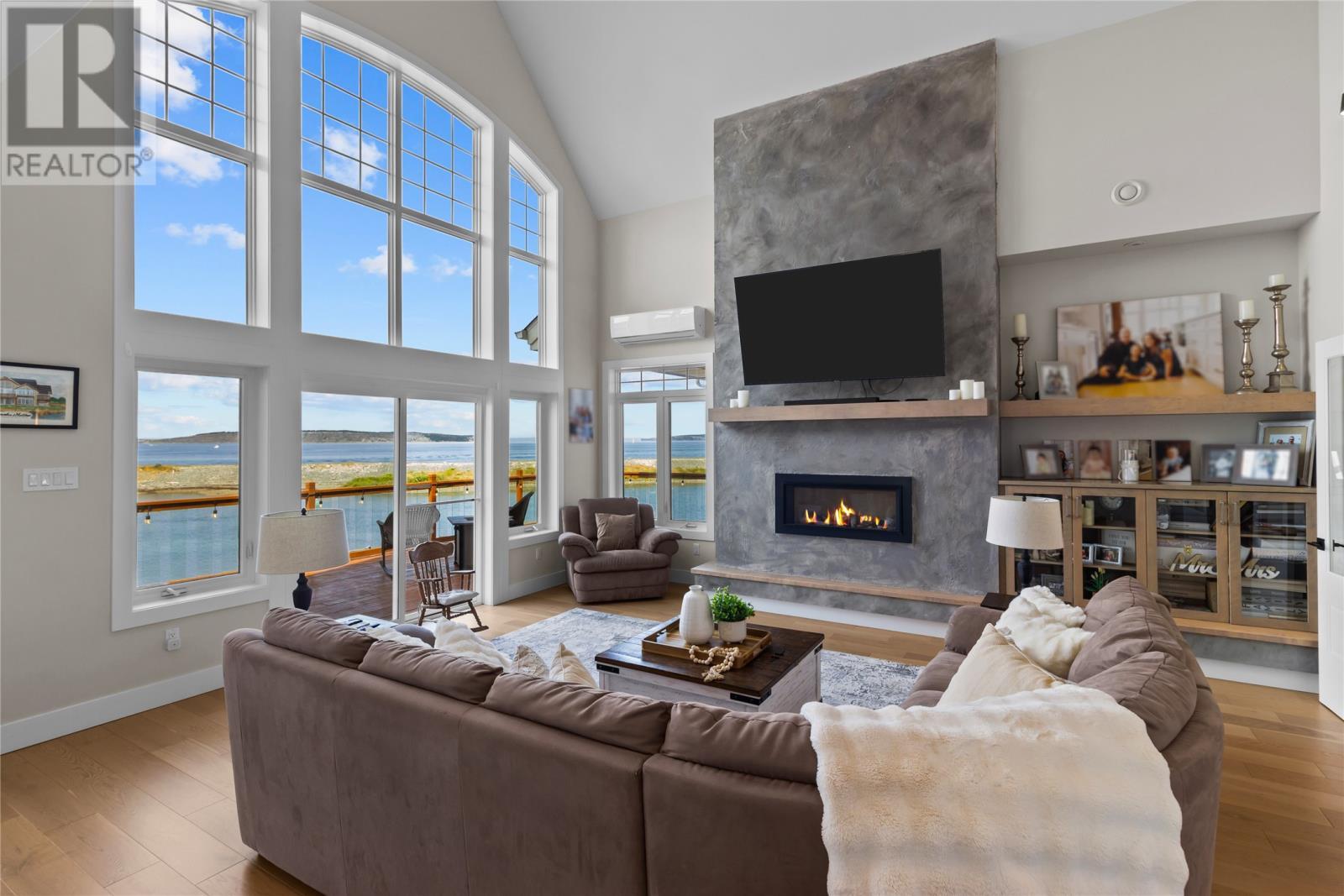 7 Commodore Place, Conception Bay South, NL - Indoor Photo Showing Living Room With Fireplace