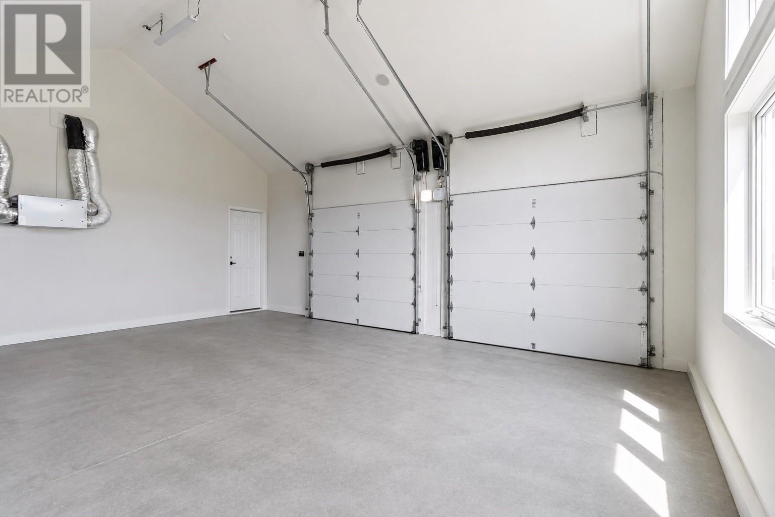 7 Commodore Place, Conception Bay South, NL - Indoor Photo Showing Garage