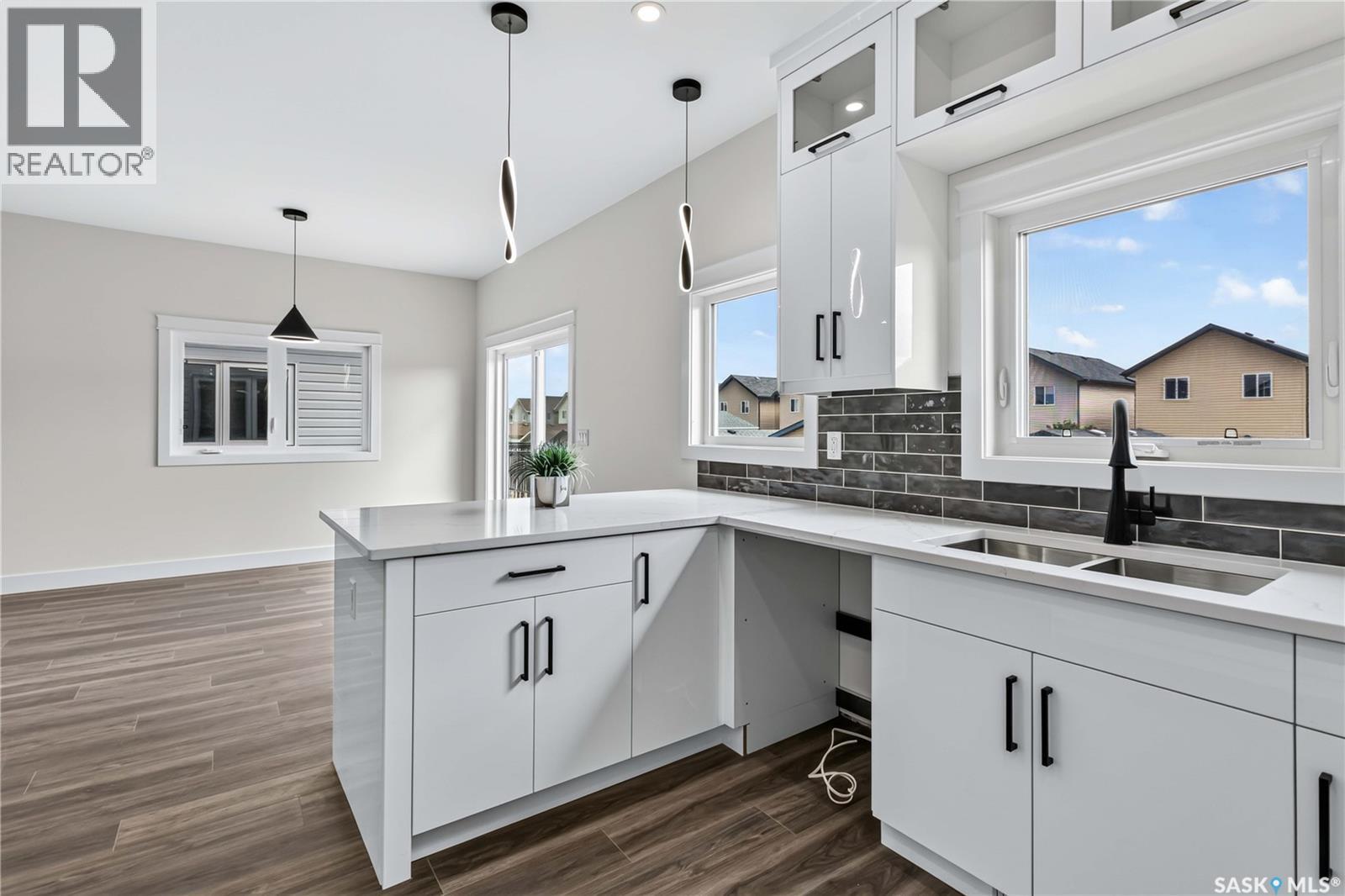 1211 Nightingale Terrace, Saskatoon, SK - Indoor Photo Showing Kitchen With Double Sink With Upgraded Kitchen