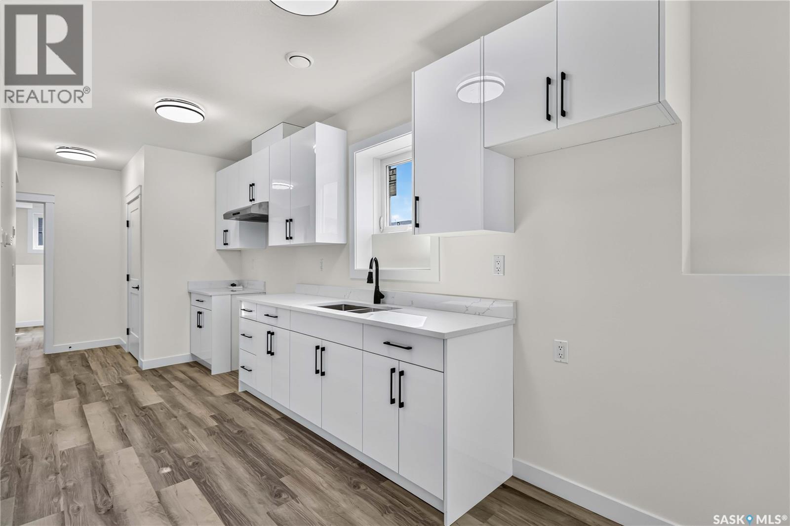 1211 Nightingale Terrace, Saskatoon, SK - Indoor Photo Showing Kitchen With Double Sink