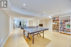 Features Laminate Floor, Pot Lights, and Windows - 