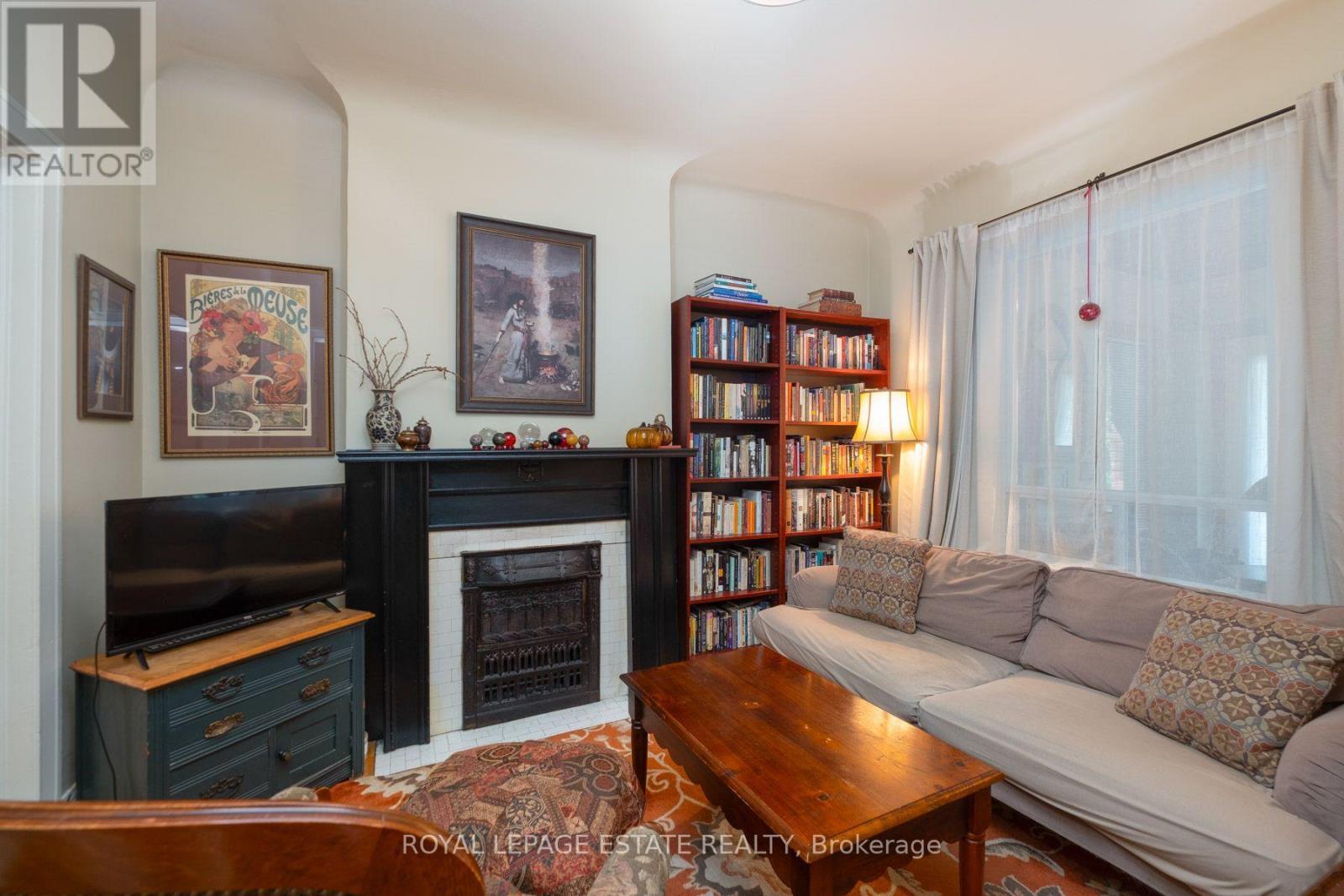 57 Herbert Avenue, Toronto, ON - Indoor Photo Showing Living Room With Fireplace