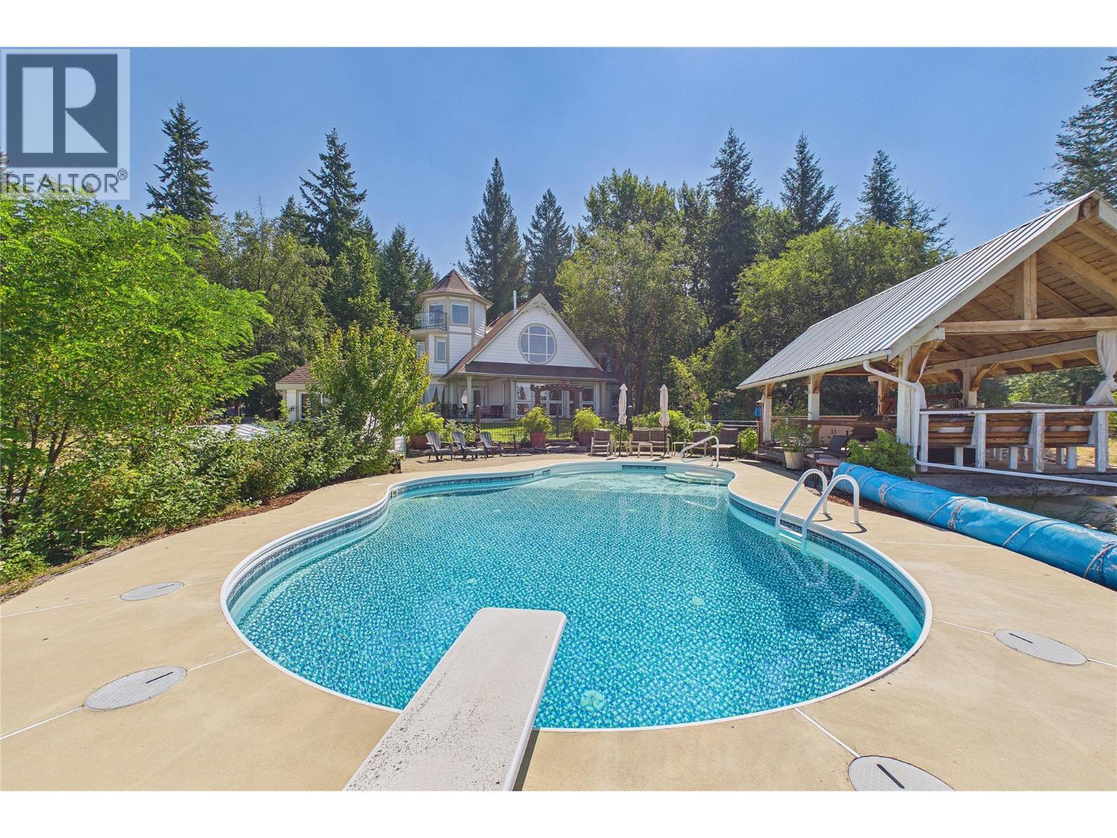 114 Bear End Road, Penticton, BC - Outdoor With In Ground Pool With Deck Patio Veranda With Backyard