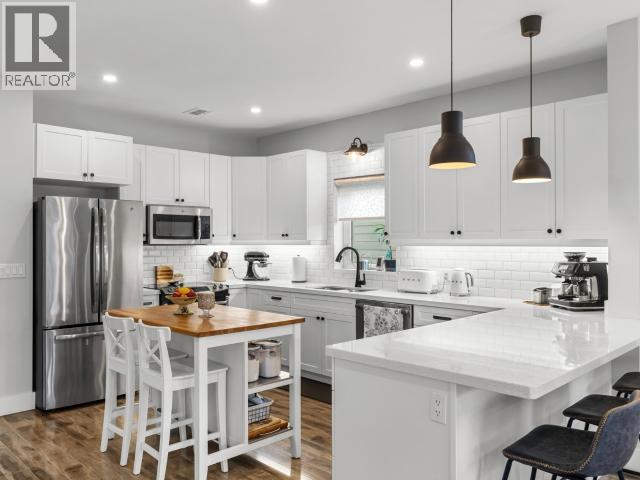 26 Iskoot Crescent, Whitehorse, YT - Indoor Photo Showing Kitchen With Upgraded Kitchen