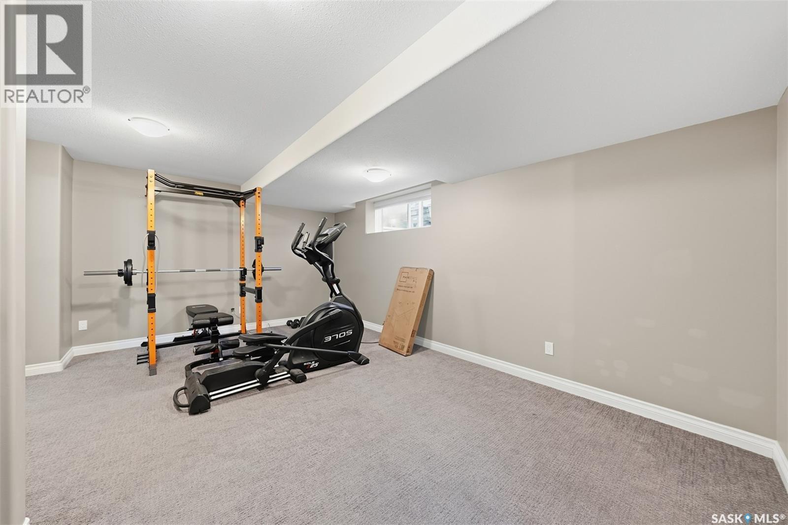 275 Wyant Lane, Saskatoon, SK - Indoor Photo Showing Gym Room