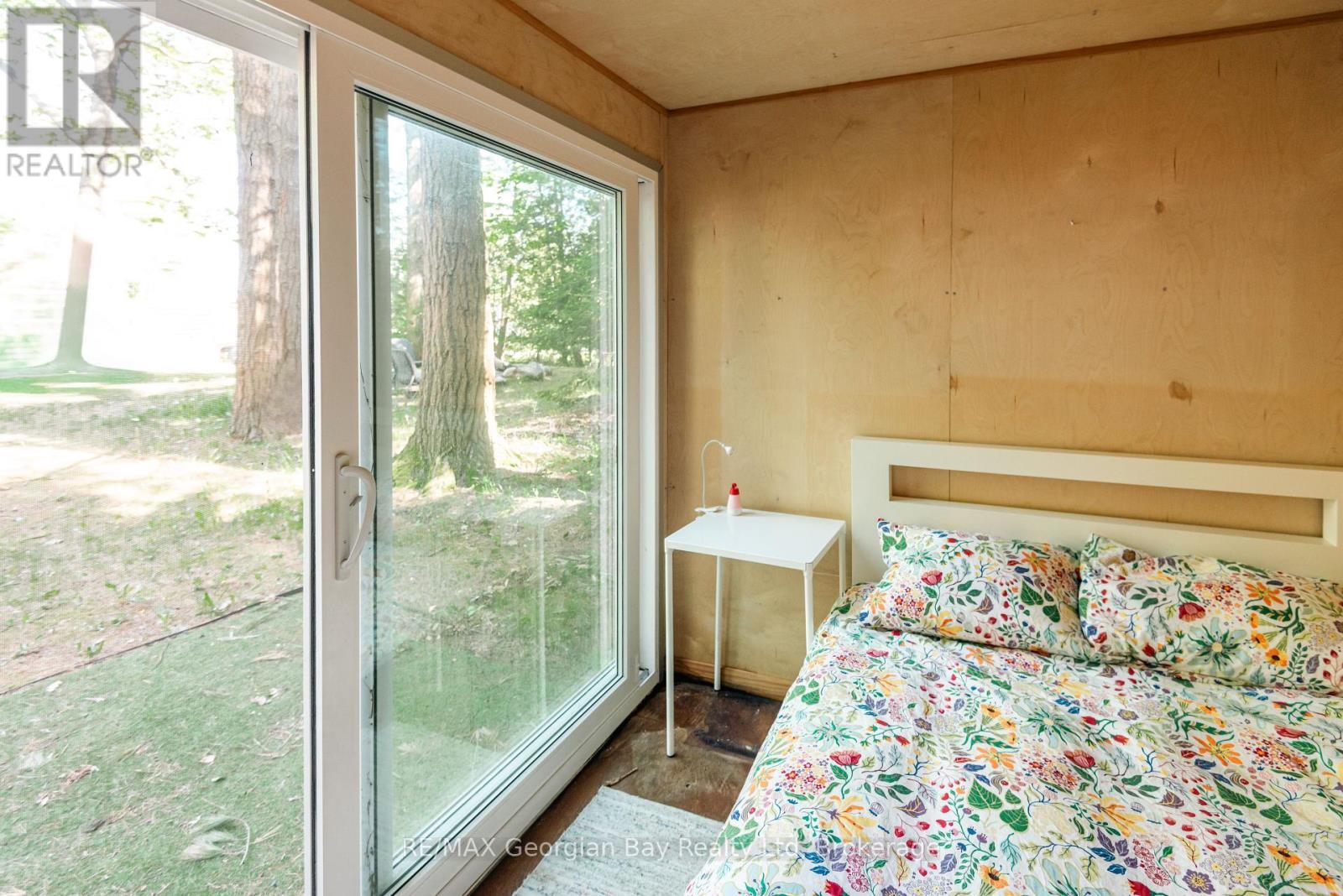 8 Sunrise Court, Tiny, ON - Indoor Photo Showing Bedroom