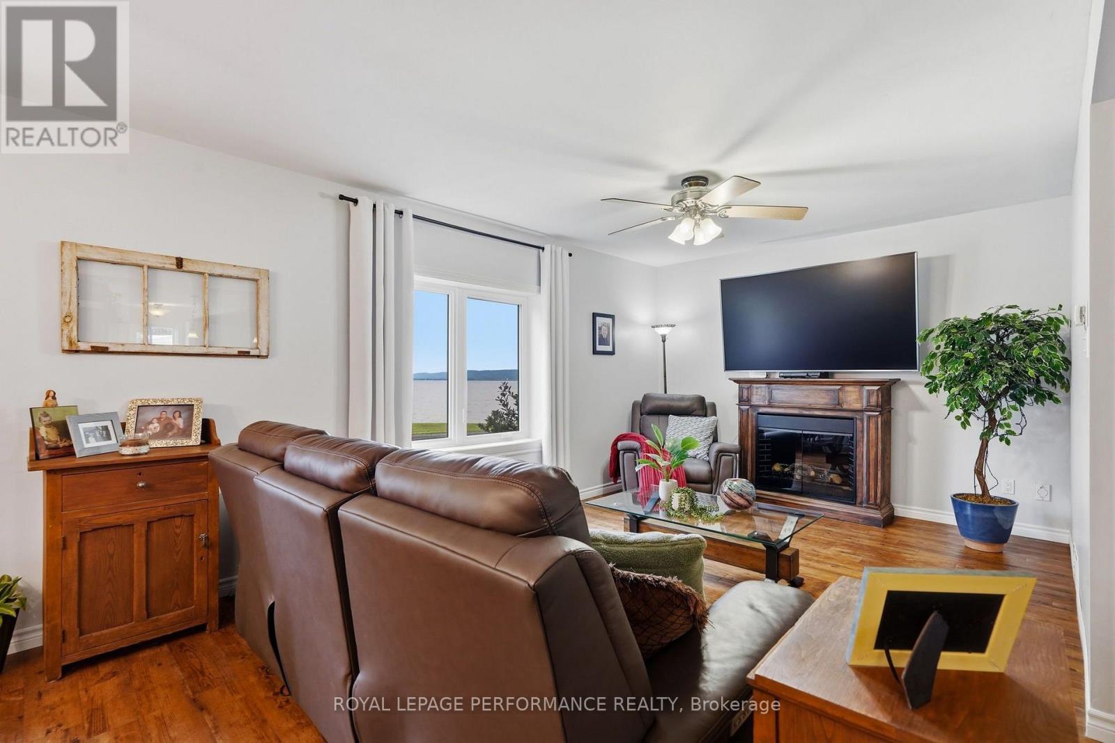1178 Bay Road, Champlain, ON - Indoor Photo Showing Living Room With Fireplace