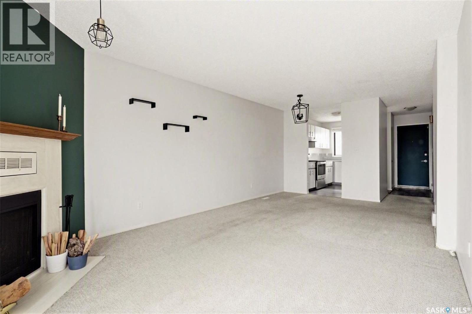 6419 Rochdale Boulevard, Regina, SK - Indoor With Fireplace