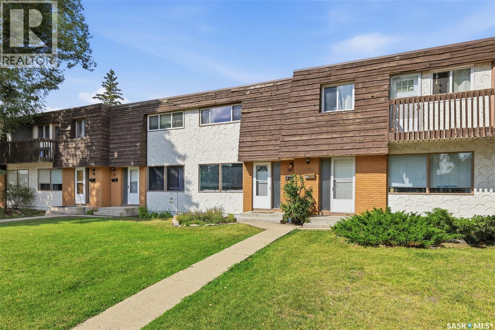 58 120 Acadia Drive, Saskatoon, SK - Outdoor With Facade