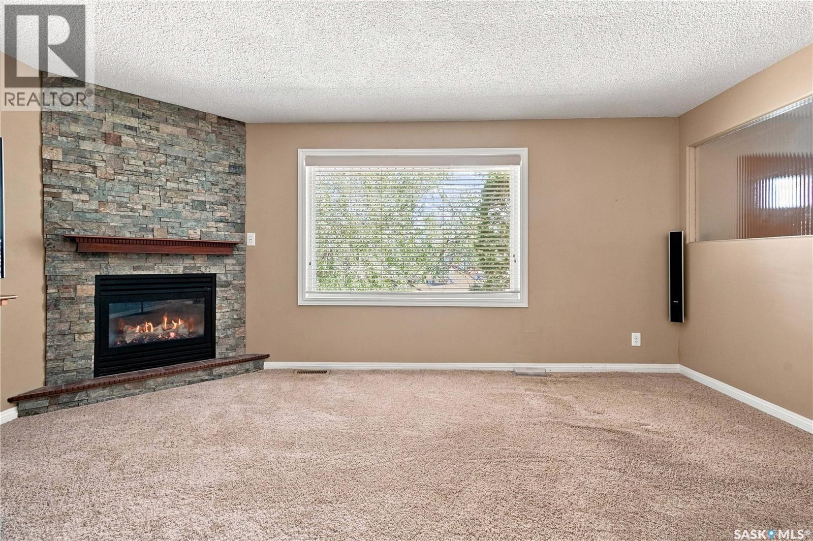 632 Grey Street, Regina, SK - Indoor Photo Showing Other Room With Fireplace