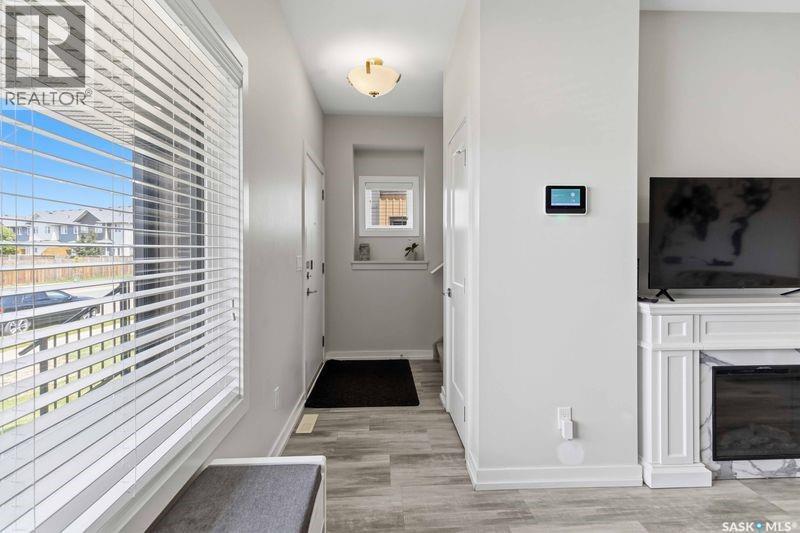 635 Evergreen Boulevard, Saskatoon, SK - Indoor Photo Showing Other Room With Fireplace