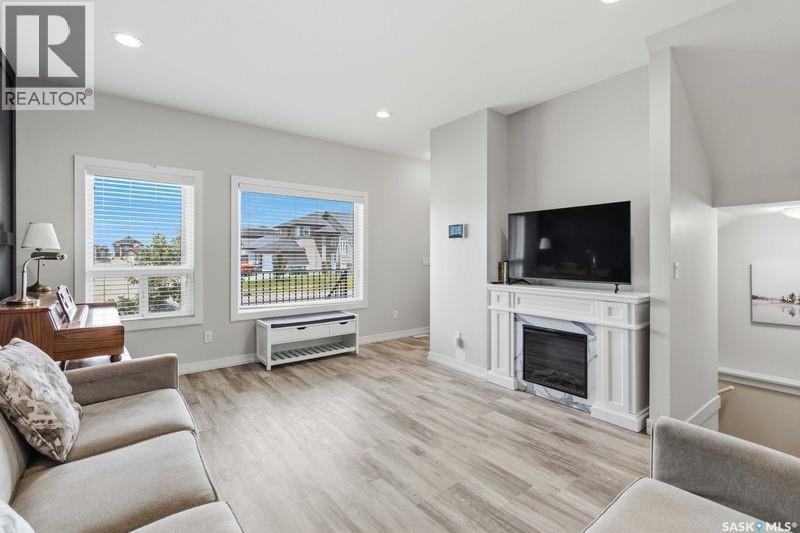 635 Evergreen Boulevard, Saskatoon, SK - Indoor Photo Showing Living Room With Fireplace