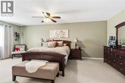Recessed lighting, ceiling fan, and carpeted flooring - 