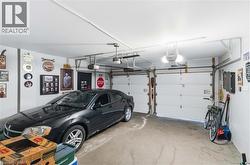 Two-car garage featuring automatic openers and overhead lighting - 
