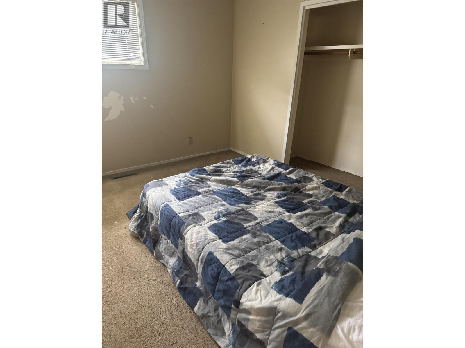 20 Kerry Crescent, Mackenzie, BC - Indoor Photo Showing Bedroom