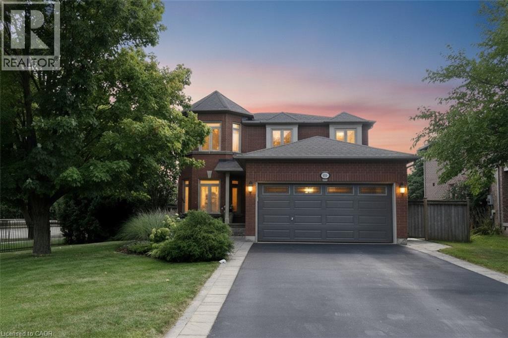 Brick exterior with multiple gables, bay windows, and a black shingle roof - 470 Amanda Crescent, Burlington, ON - Outdoor With Facade