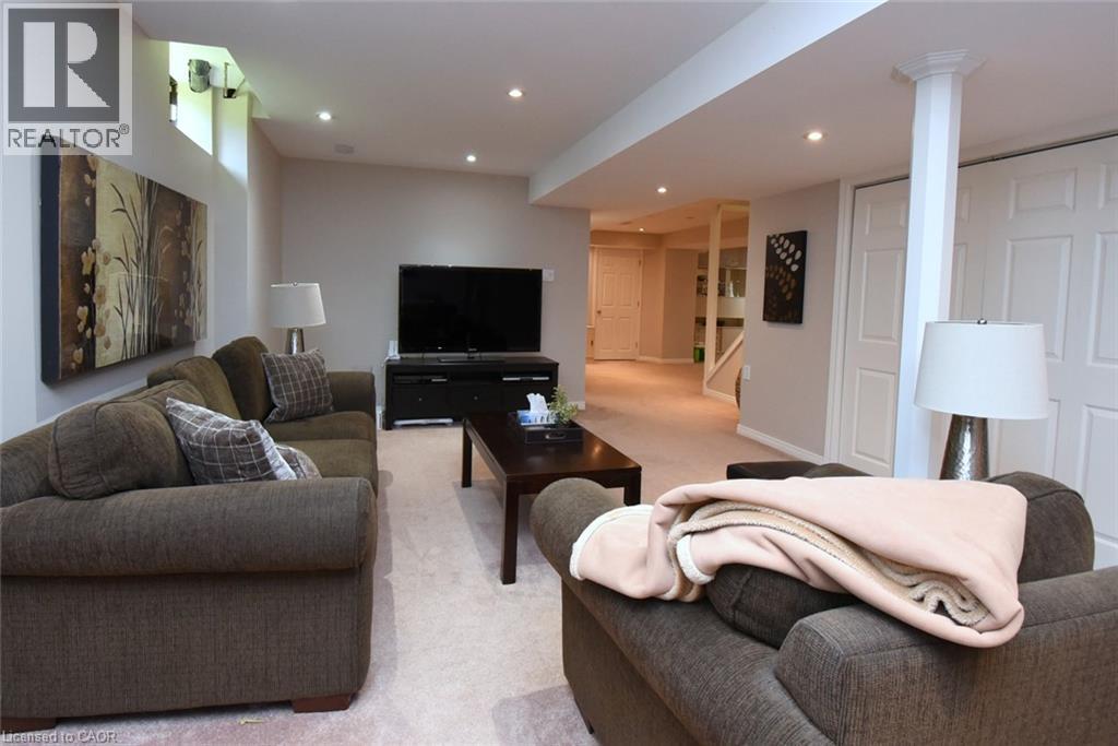 Recessed lighting and light-toned carpeting - 470 Amanda Crescent, Burlington, ON - Indoor