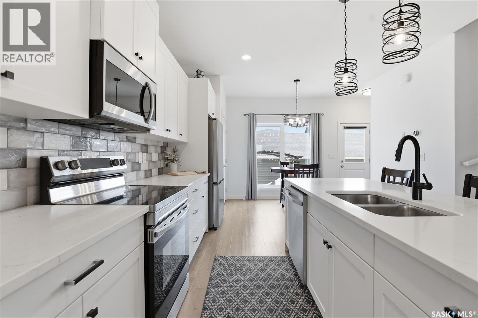 520 Brighton Gate, Saskatoon, SK - Indoor Photo Showing Kitchen With Double Sink With Upgraded Kitchen