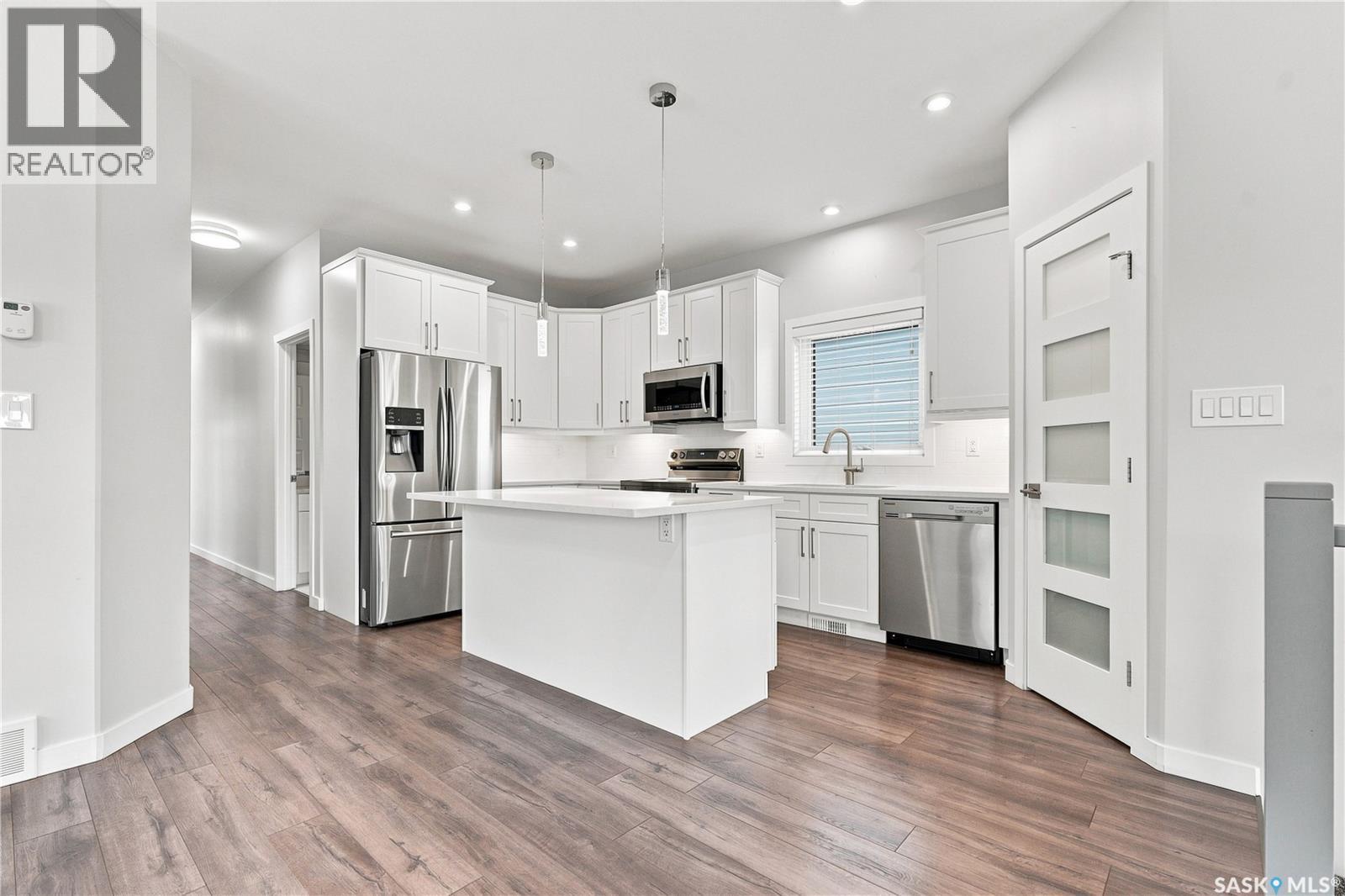134 Bolstad Way, Saskatoon, SK - Indoor Photo Showing Kitchen With Stainless Steel Kitchen With Upgraded Kitchen