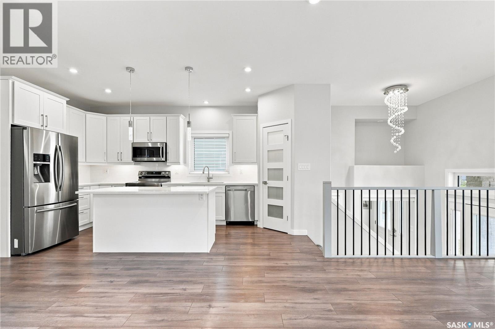 134 Bolstad Way, Saskatoon, SK - Indoor Photo Showing Kitchen With Stainless Steel Kitchen With Upgraded Kitchen