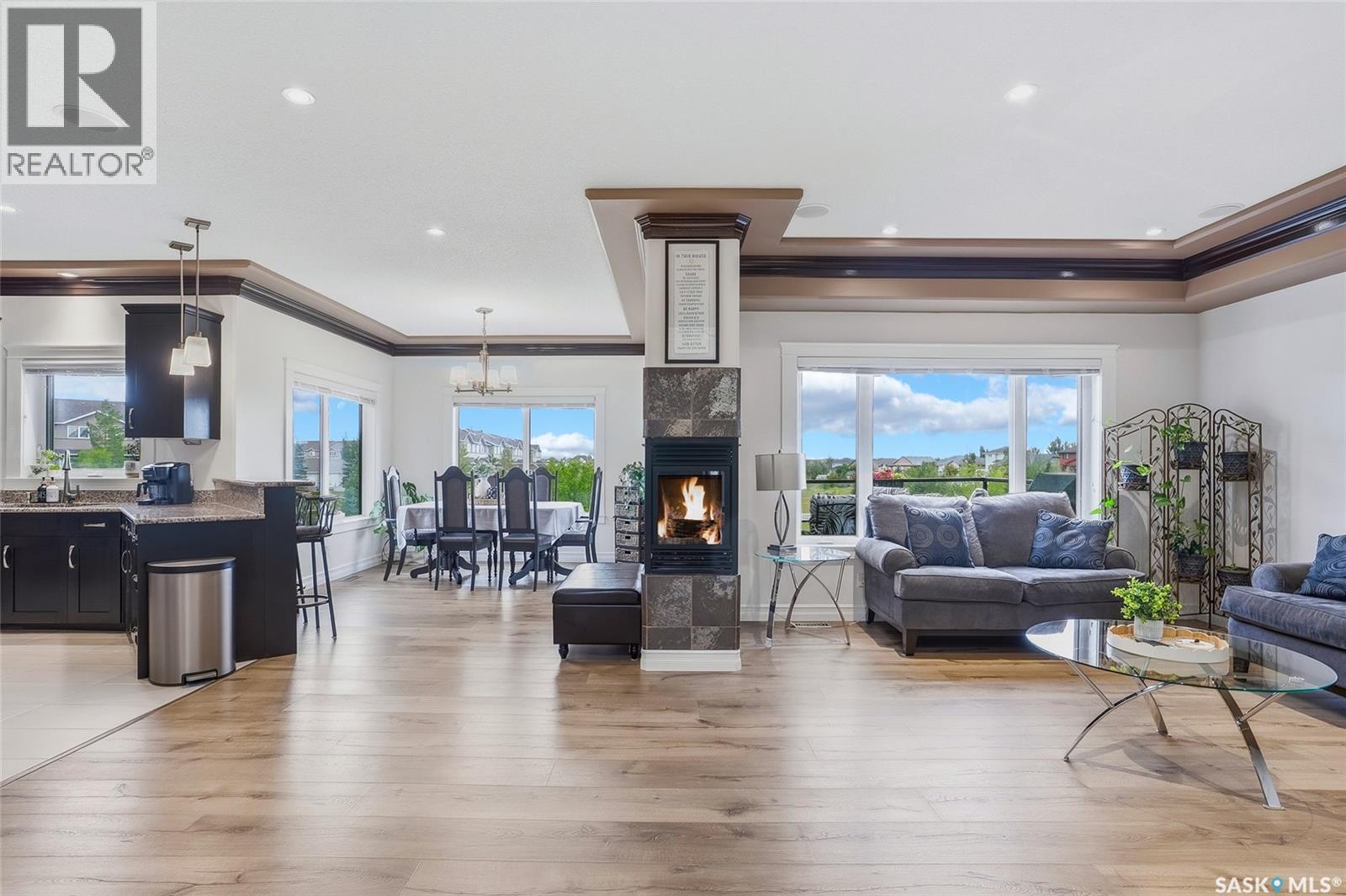 242 Denham Crescent, Saskatoon, SK - Indoor Photo Showing Living Room With Fireplace