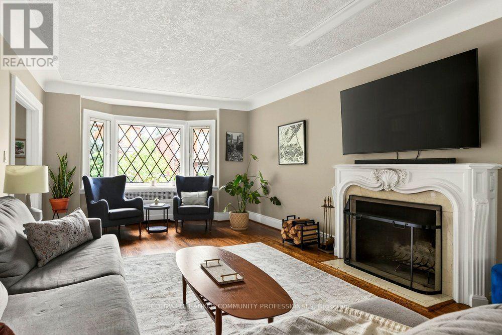 71 Stanley Avenue, Hamilton, ON - Indoor Photo Showing Living Room With Fireplace