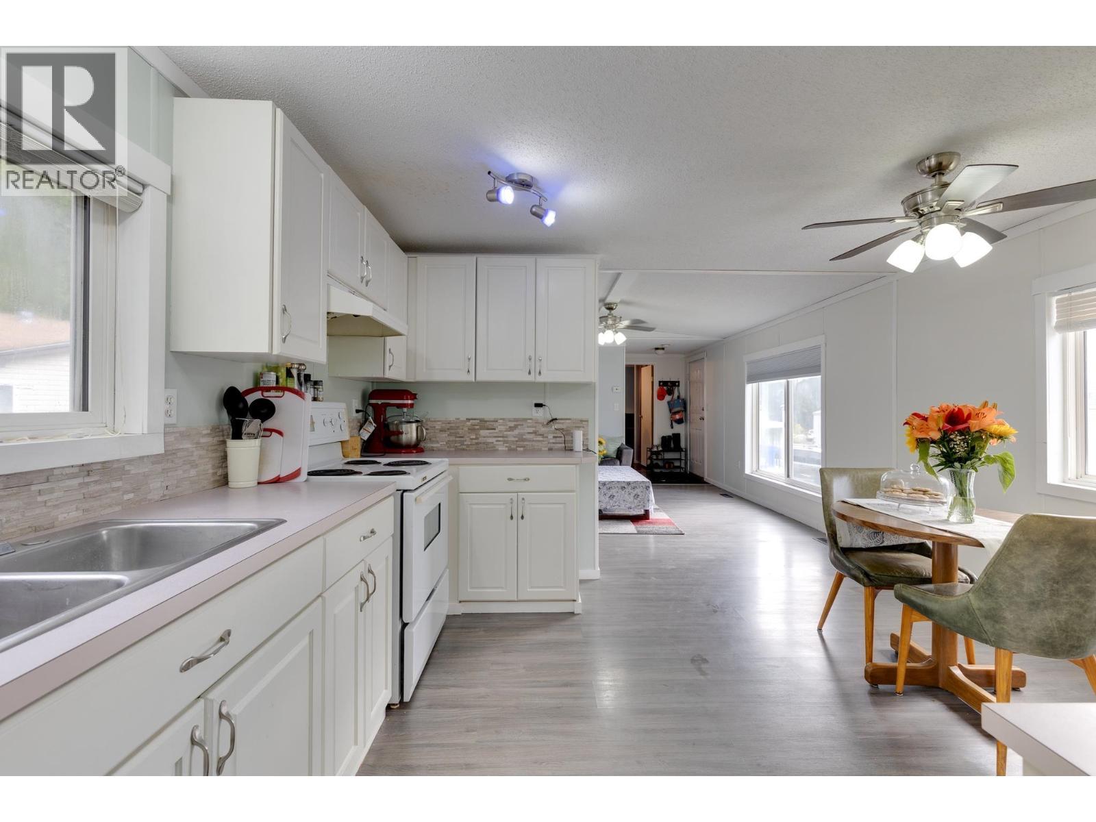 181 2500 Grant Road, Prince George, BC - Indoor Photo Showing Kitchen With Double Sink