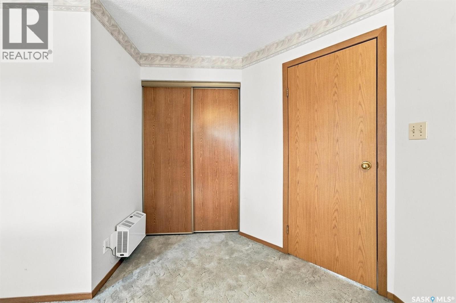 202 1215 Louise Avenue, Saskatoon, SK - Indoor Photo Showing Other Room