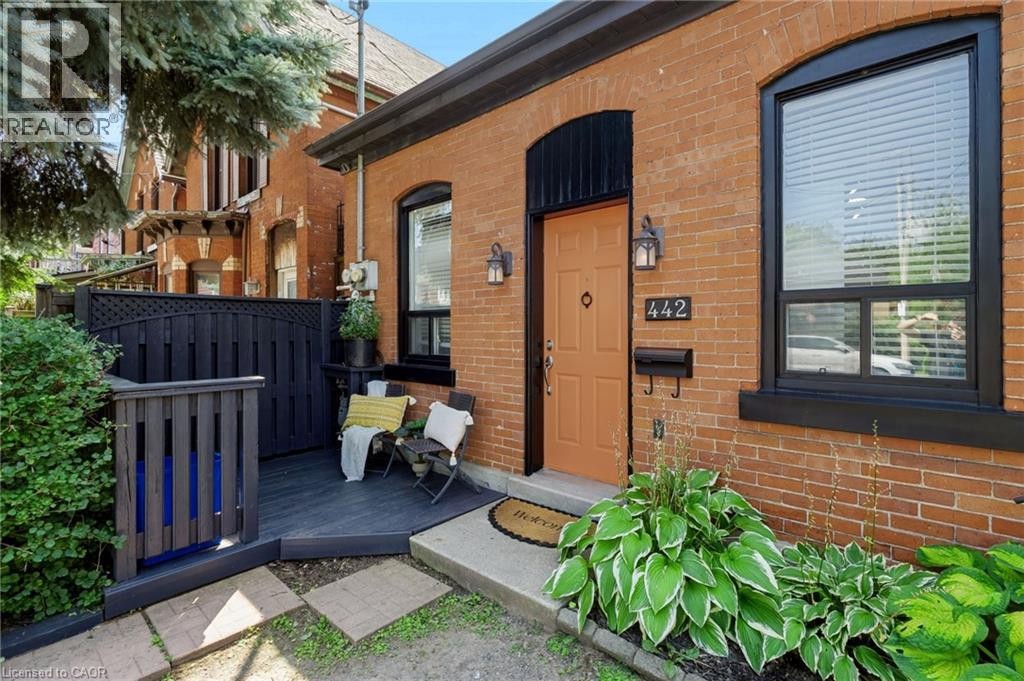 Brick exterior with black trim windows - 442 King William Street, Hamilton, ON - Outdoor With Exterior