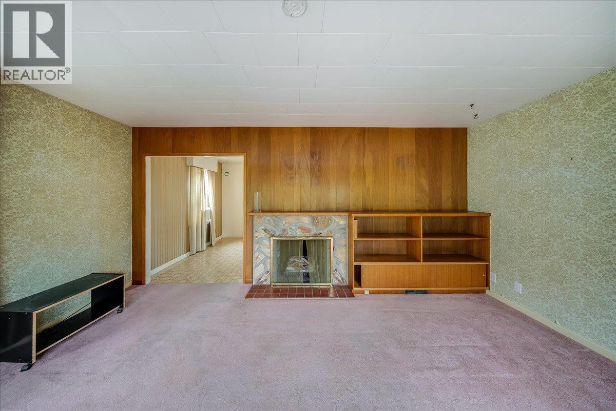 306 Sylvia Crescent, Trail, BC - Indoor Photo Showing Other Room With Fireplace