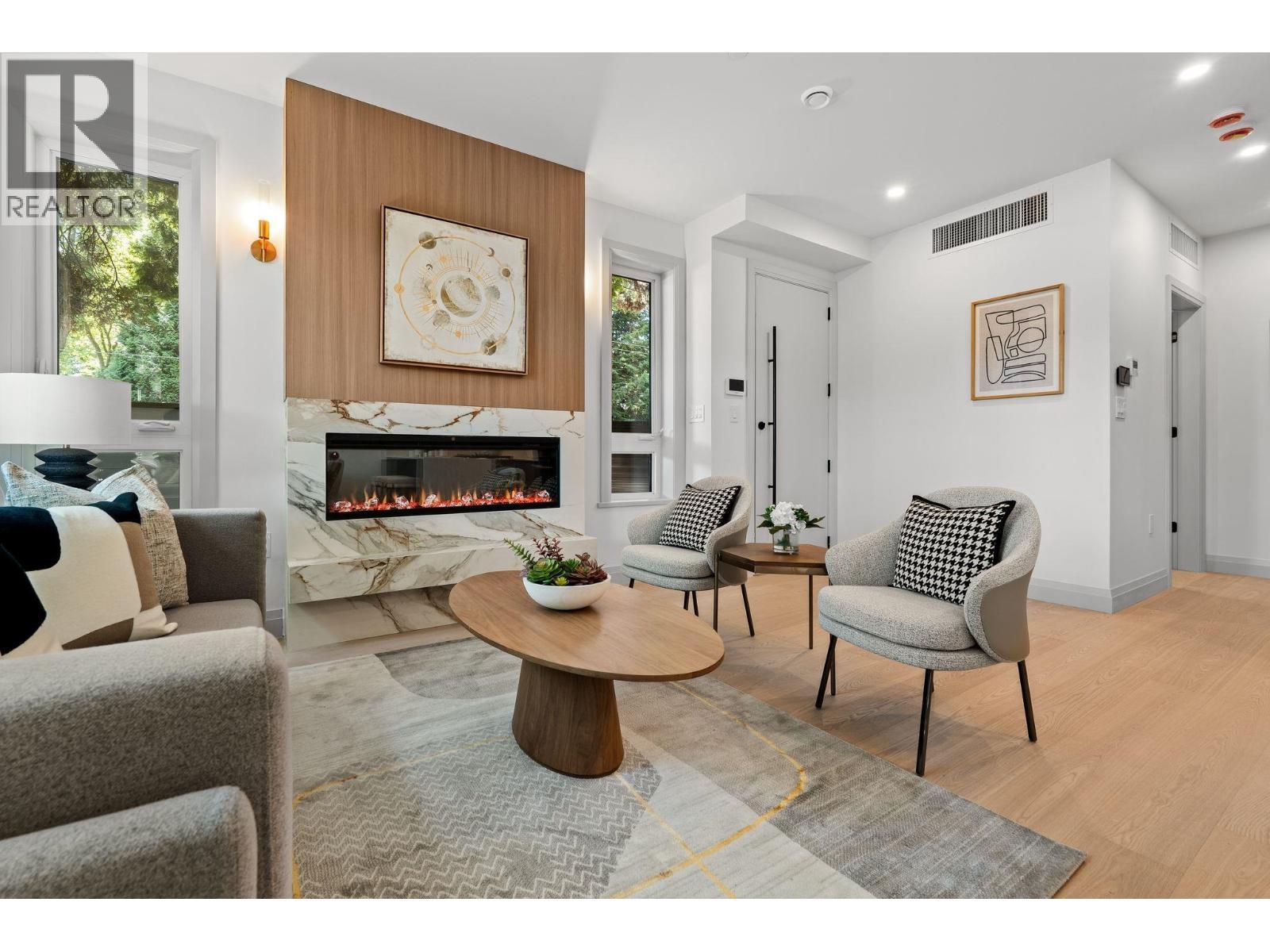 4 1491 Devonshire Crescent, Vancouver, BC - Indoor Photo Showing Living Room With Fireplace