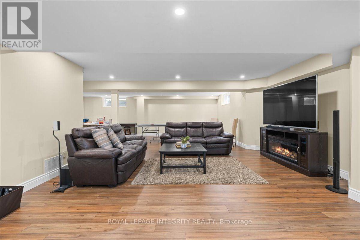 40 Bon Echo Crescent, Ottawa, ON - Indoor Photo Showing Other Room With Fireplace