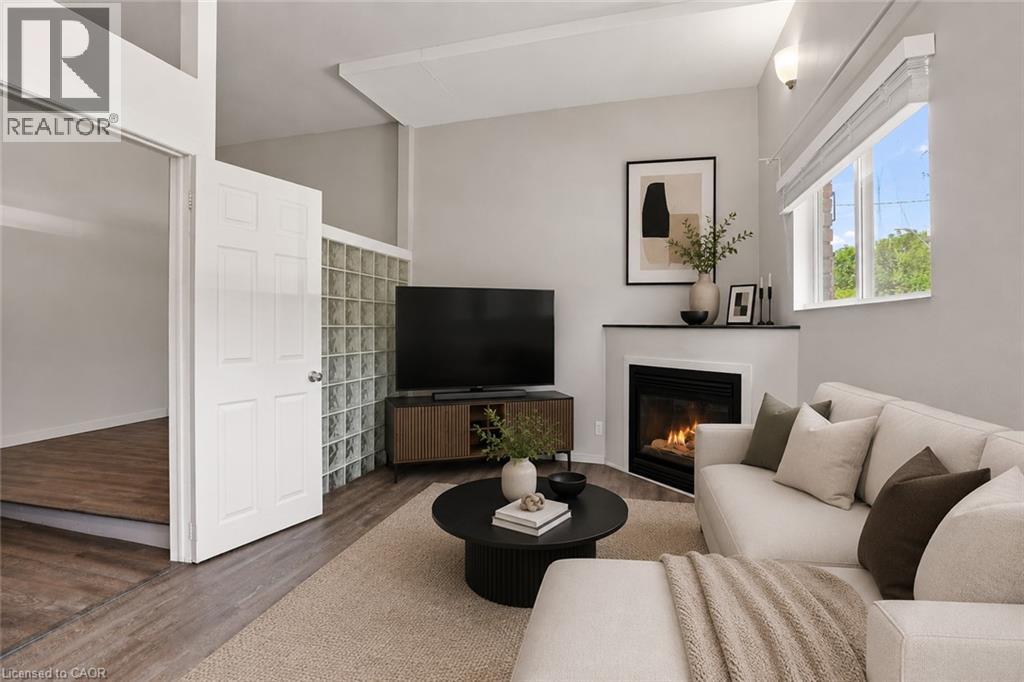 Virtually Staged - 24 Hill Street, Hamilton, ON - Indoor Photo Showing Living Room With Fireplace