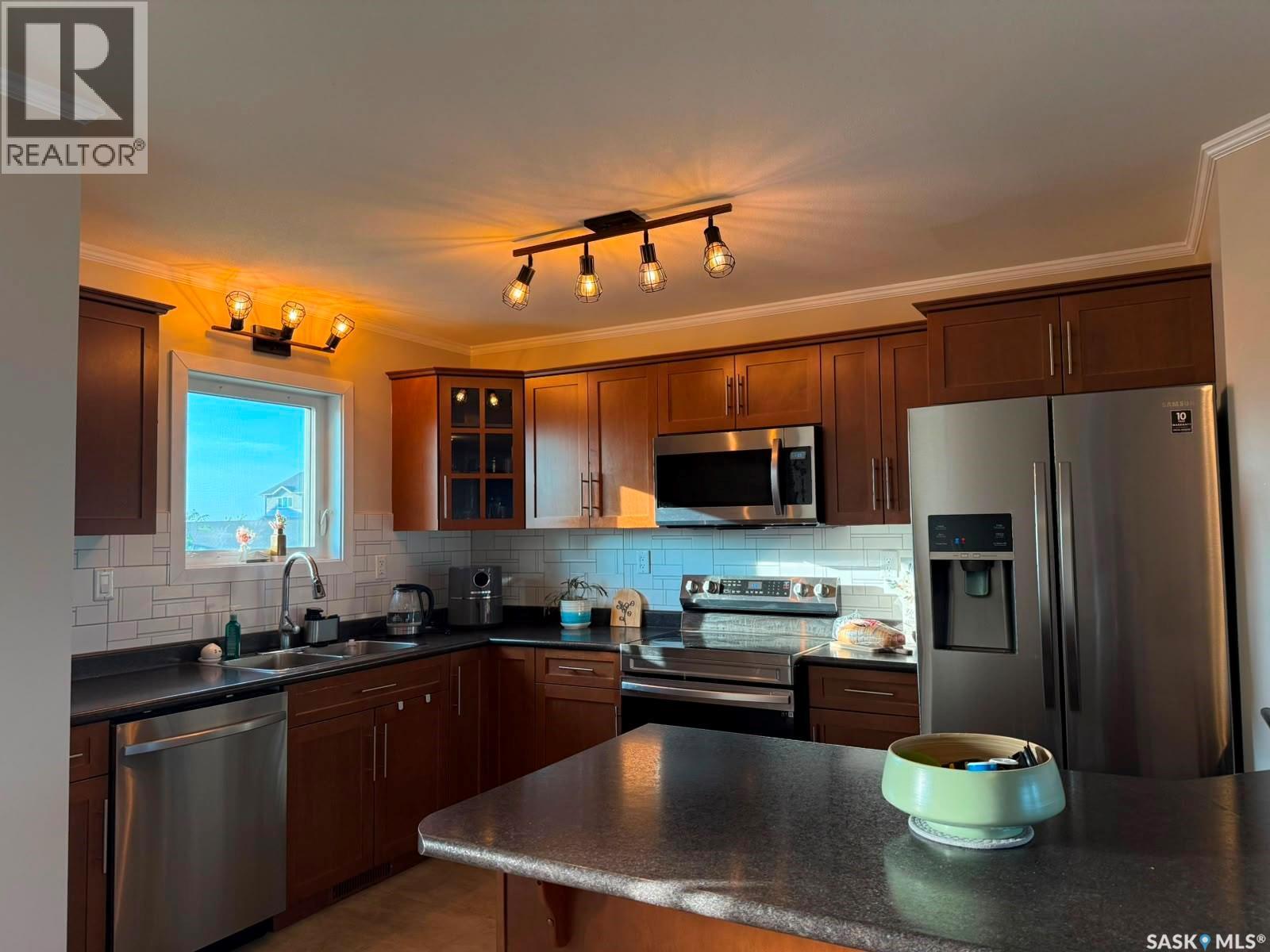 708 1303 Richardson Road, Saskatoon, SK - Indoor Photo Showing Kitchen With Stainless Steel Kitchen With Double Sink