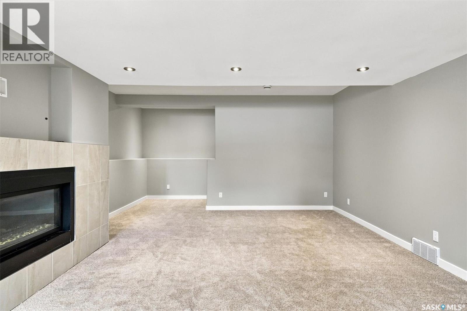215 Padget Crescent, Saskatoon, SK - Indoor With Fireplace