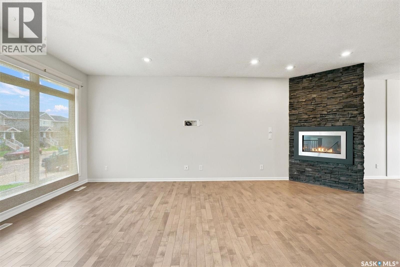 215 Padget Crescent, Saskatoon, SK - Indoor With Fireplace