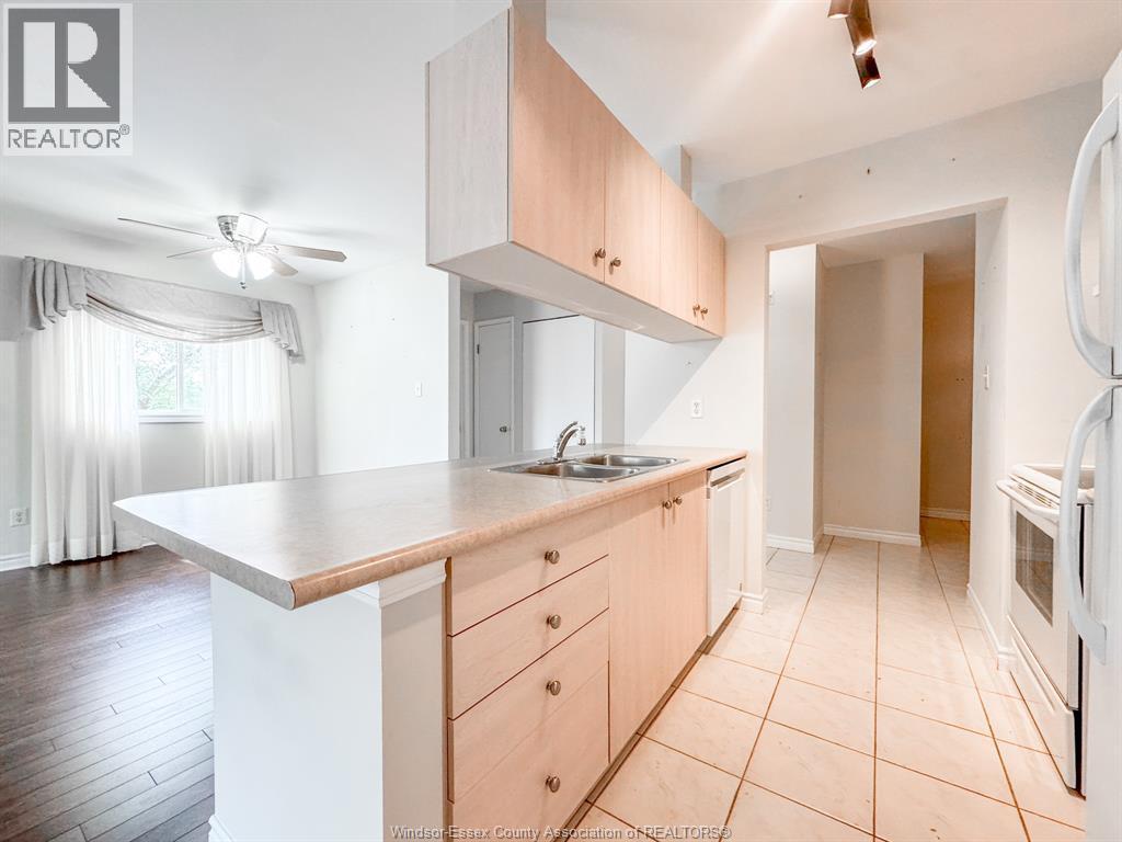 1655 Grand Marais Unit# 310, Windsor, ON - Indoor Photo Showing Kitchen With Double Sink