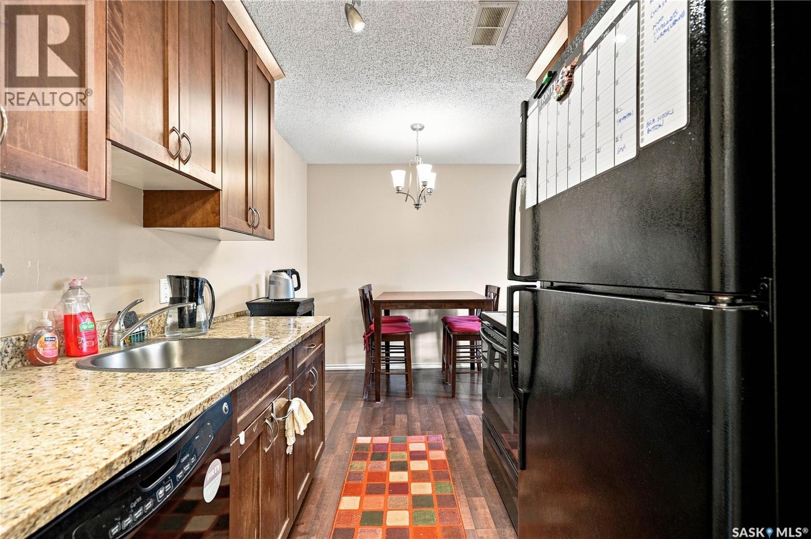 303 258 Pinehouse Place, Saskatoon, SK - Indoor Photo Showing Kitchen