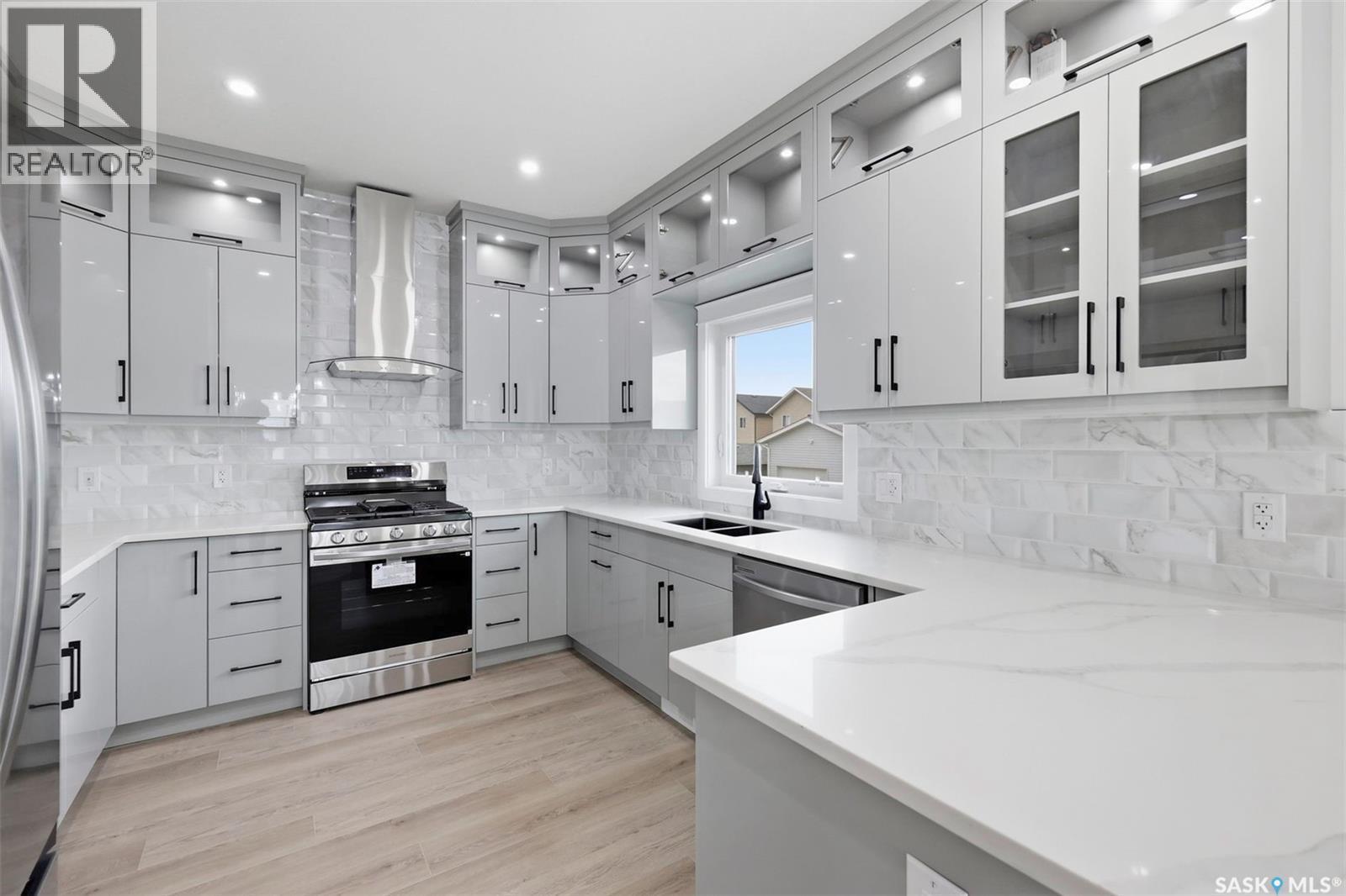 1215 Nightingale Terrace, Saskatoon, SK - Indoor Photo Showing Kitchen With Double Sink With Upgraded Kitchen