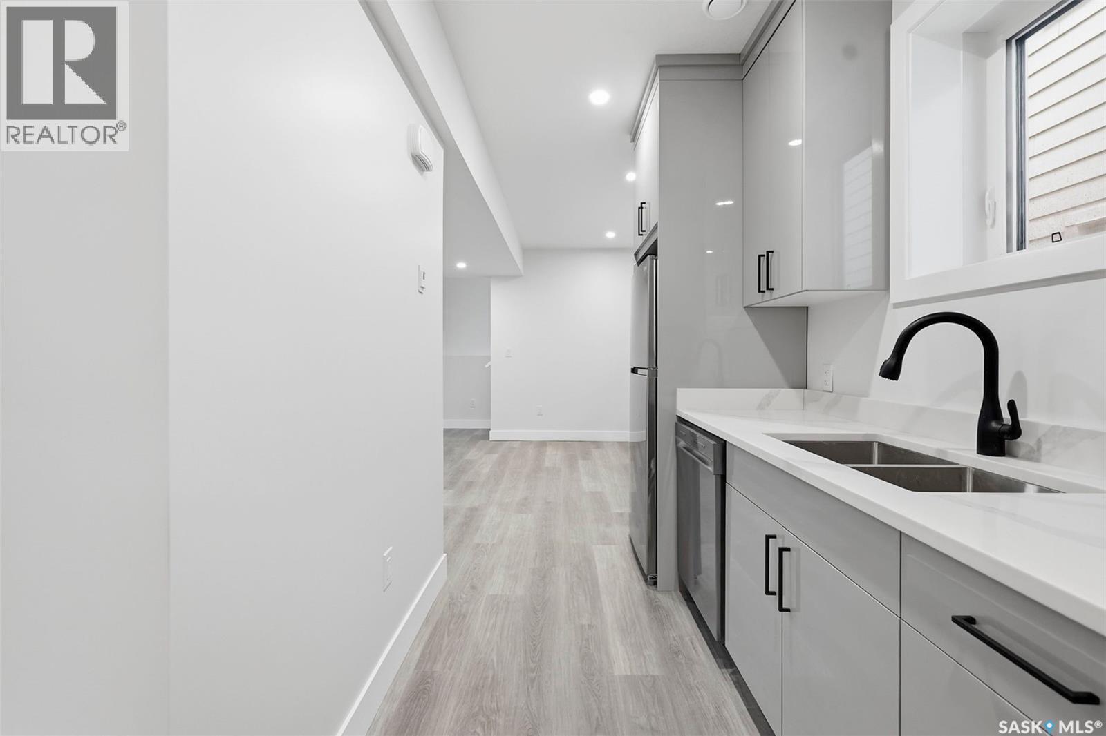 1215 Nightingale Terrace, Saskatoon, SK - Indoor Photo Showing Kitchen With Double Sink